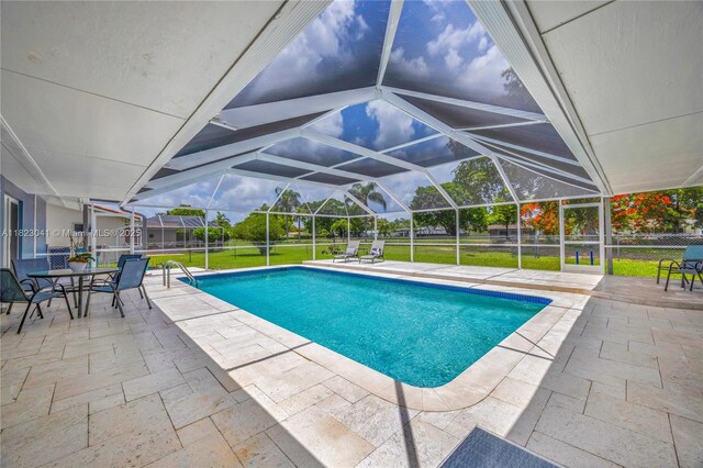 8861 SW 85th St, Miami, FL 33173 - outdoor pool with a patio and glass enclosure