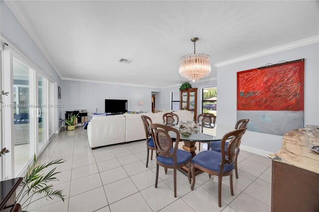 8861 SW 85th St, Miami, FL 33173 - dining room with ornamental molding, light tile patterned floors, and a chandelier