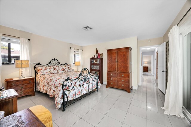 8861 SW 85th St, Miami, FL 33173 - bedroom featuring light tile patterned floors