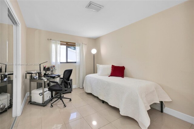 8861 SW 85th St, Miami, FL 33173 - bedroom featuring a desk and light tile patterned floors