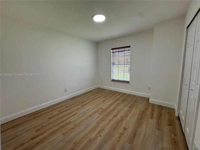 737 SE Brookedge Ave, Port St Lucie, FL 34983 - unfurnished bedroom with a closet and light wood-style flooring