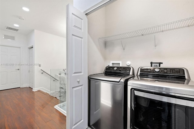 8780 NW 116th Path, Doral, FL 33178 - laundry area featuring washer and dryer, dark wood-style floors, and recessed lighting
