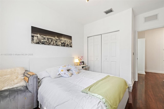 8780 NW 116th Path, Doral, FL 33178 - bedroom featuring hardwood / wood-style flooring and a closet