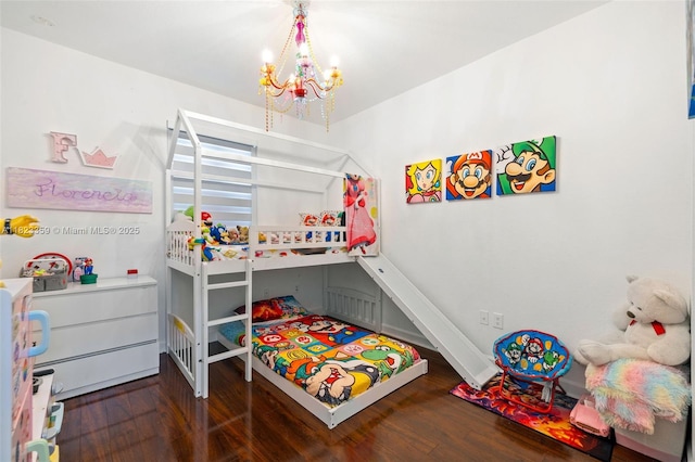 8780 NW 116th Path, Doral, FL 33178 - bedroom featuring a chandelier and wood finished floors