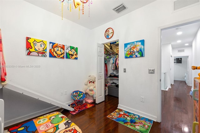 8780 NW 116th Path, Doral, FL 33178 - rec room with wood-type flooring, a chandelier, and recessed lighting