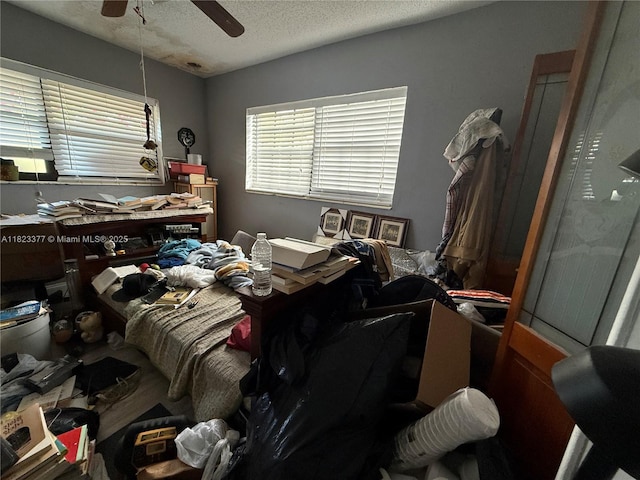 7080 Hope St, Hollywood, FL 33024 - bedroom with a textured ceiling and ceiling fan