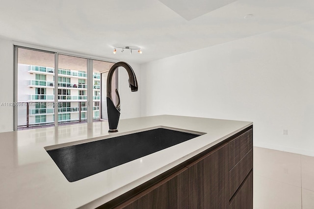 488 NE 18th St Unit 3105, Miami, FL 33132 - detailed view of light countertops, dark brown cabinets, and modern cabinets