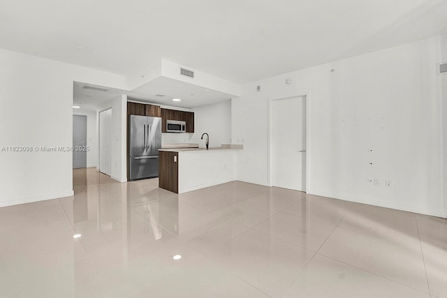 488 NE 18th St Unit 3105, Miami, FL 33132 - unfurnished living room with light tile patterned floors and baseboards