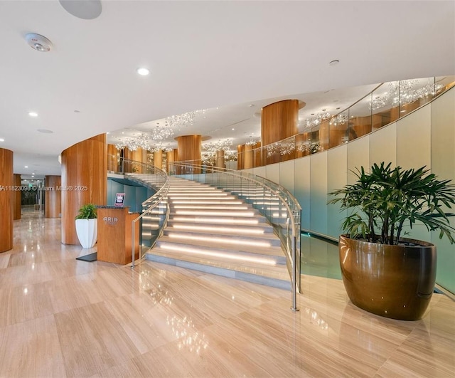 488 NE 18th St Unit 3105, Miami, FL 33132 - staircase featuring recessed lighting