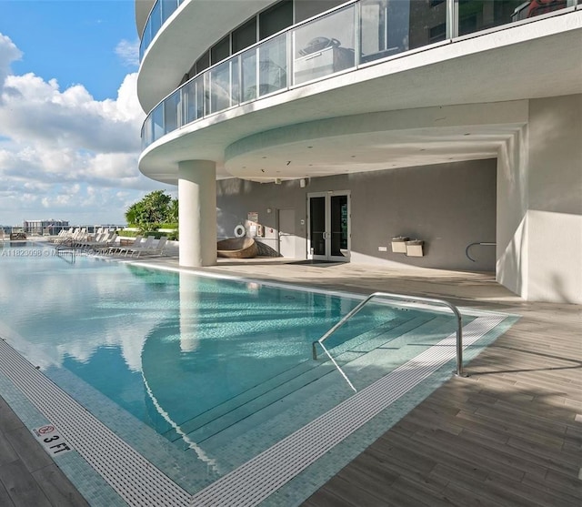 488 NE 18th St Unit 3105, Miami, FL 33132 - community pool with french doors and a patio area