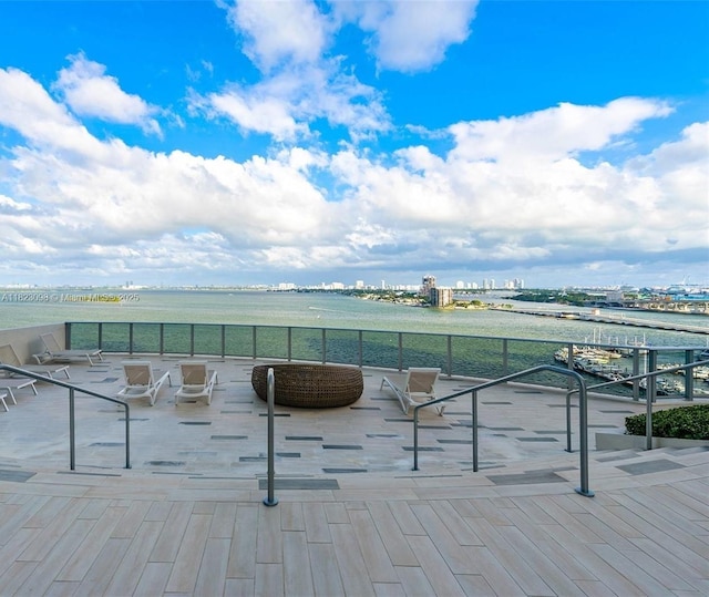 488 NE 18th St Unit 3105, Miami, FL 33132 - view of patio with a water view