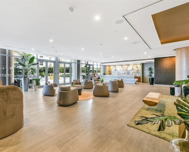 488 NE 18th St Unit 3105, Miami, FL 33132 - community lobby featuring a wall of windows and recessed lighting