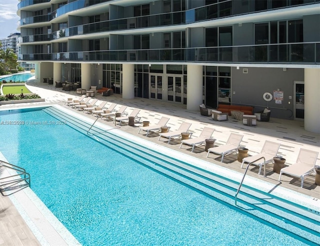 488 NE 18th St Unit 3105, Miami, FL 33132 - community pool featuring a patio