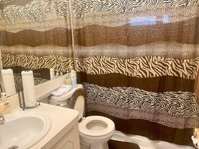 1311 NW 43rd Ave Unit 102, Lauderhill, FL 33313 - bathroom featuring toilet and vanity