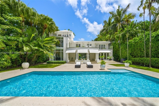 1839 W 24th St, Miami Beach, FL 33140 - swimming pool featuring a patio area and outdoor lounge area
