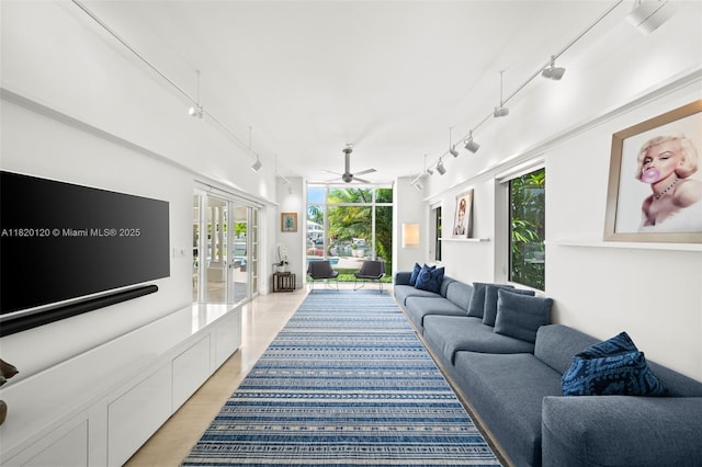 1839 W 24th St, Miami Beach, FL 33140 - living area with rail lighting, french doors, and ceiling fan