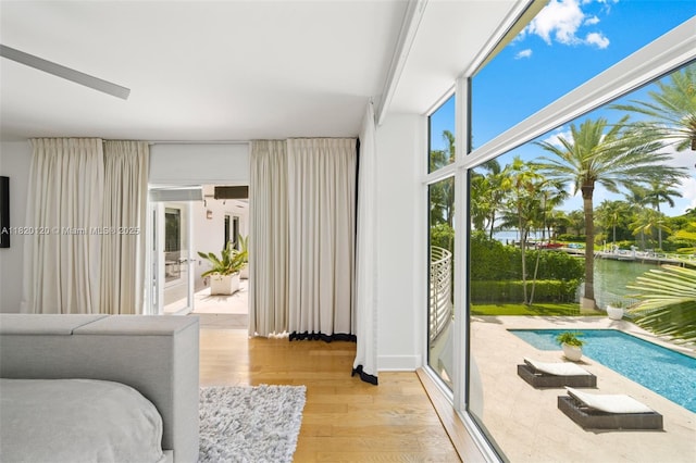 1839 W 24th St, Miami Beach, FL 33140 - bedroom featuring light wood-style flooring and a water view