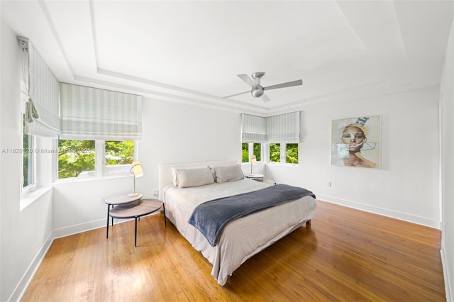 1839 W 24th St, Miami Beach, FL 33140 - bedroom featuring multiple windows, wood finished floors, and ceiling fan