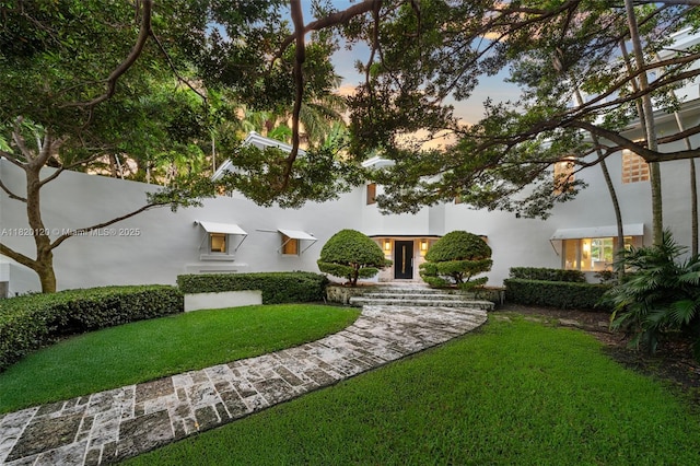 1839 W 24th St, Miami Beach, FL 33140 - view of front of property featuring a front lawn