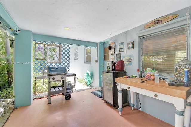 1991 NE 178th St, North Miami Beach, FL 33162 - home office featuring plenty of natural light and finished concrete flooring
