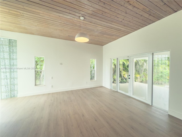 8390 SW 94th St, Miami, FL 33156 - empty room with wood ceiling, vaulted ceiling, and wood finished floors
