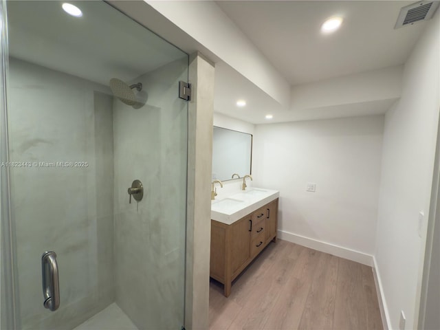 8390 SW 94th St, Miami, FL 33156 - full bathroom with recessed lighting, wood finished floors, double vanity, and a stall shower