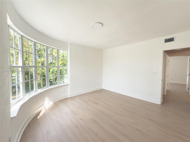 8390 SW 94th St, Miami, FL 33156 - spare room with light wood-type flooring and plenty of natural light