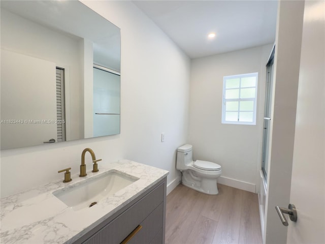 8390 SW 94th St, Miami, FL 33156 - full bathroom with vanity, wood finished floors, and recessed lighting