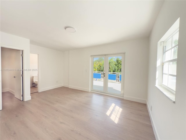 8390 SW 94th St, Miami, FL 33156 - unfurnished bedroom featuring light wood-style flooring, access to outside, and french doors