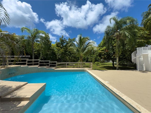 8390 SW 94th St, Miami, FL 33156 - swimming pool featuring a patio, stairs, and view of scattered trees
