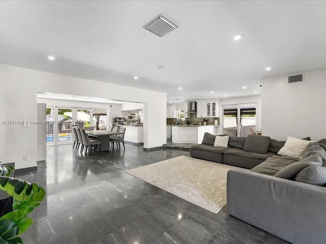 1870 NE 208th Ter, Miami, FL 33179 - living room with recessed lighting and french doors