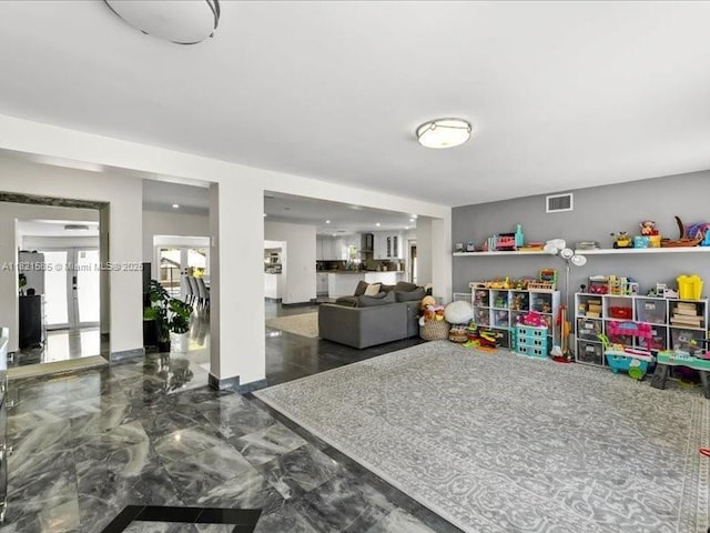 1870 NE 208th Ter, Miami, FL 33179 - playroom with marble tiled floors