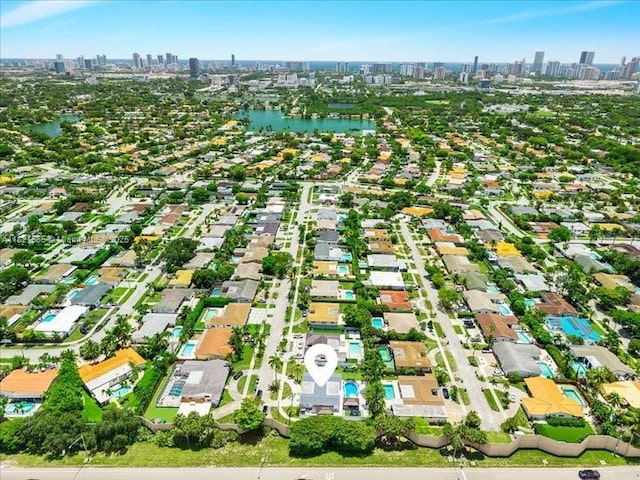 1870 NE 208th Ter, Miami, FL 33179 - aerial overview of property's location featuring city skyline and a nearby body of water
