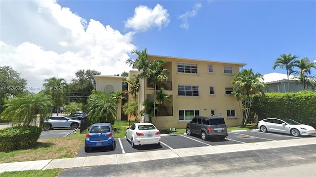 901 NE 3rd St Unit 302, Fort Lauderdale, FL 33301 - view of building exterior with uncovered parking