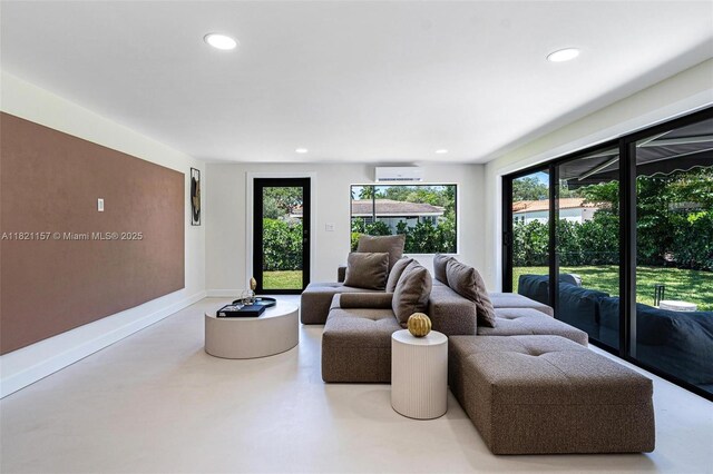 51 NE 110th St, Miami Shores, FL 33161 - living area with healthy amount of natural light, recessed lighting, and concrete floors