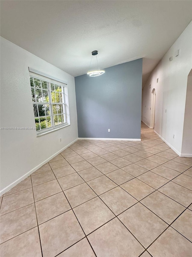 18861 SW 28th Ct, Miramar, FL 33029 - empty room with light tile patterned floors and baseboards