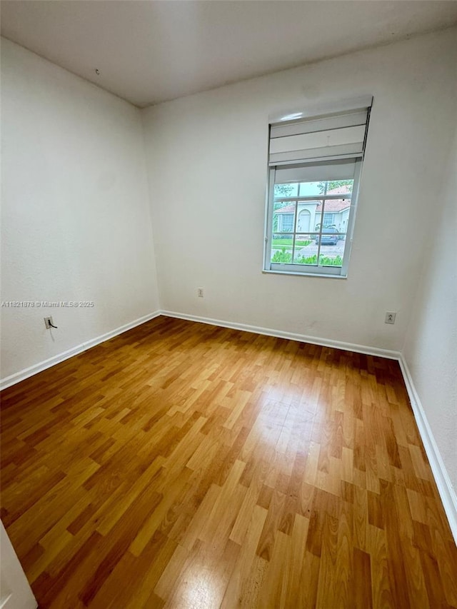 18861 SW 28th Ct, Miramar, FL 33029 - unfurnished room with wood finished floors and baseboards