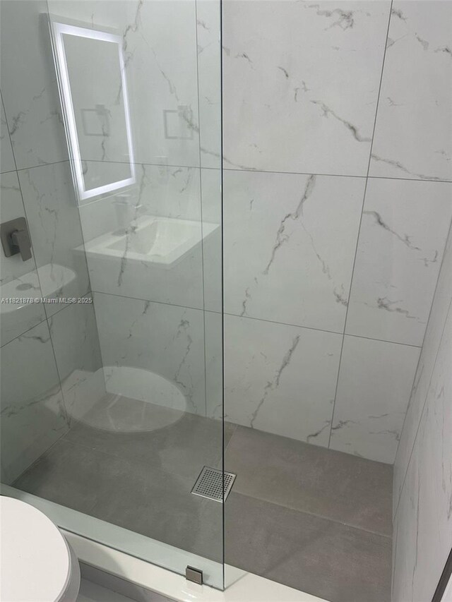 18861 SW 28th Ct, Miramar, FL 33029 - bathroom featuring toilet and a marble finish shower