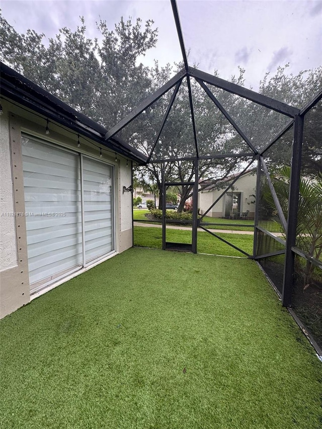 18861 SW 28th Ct, Miramar, FL 33029 - view of grassy yard with a lanai