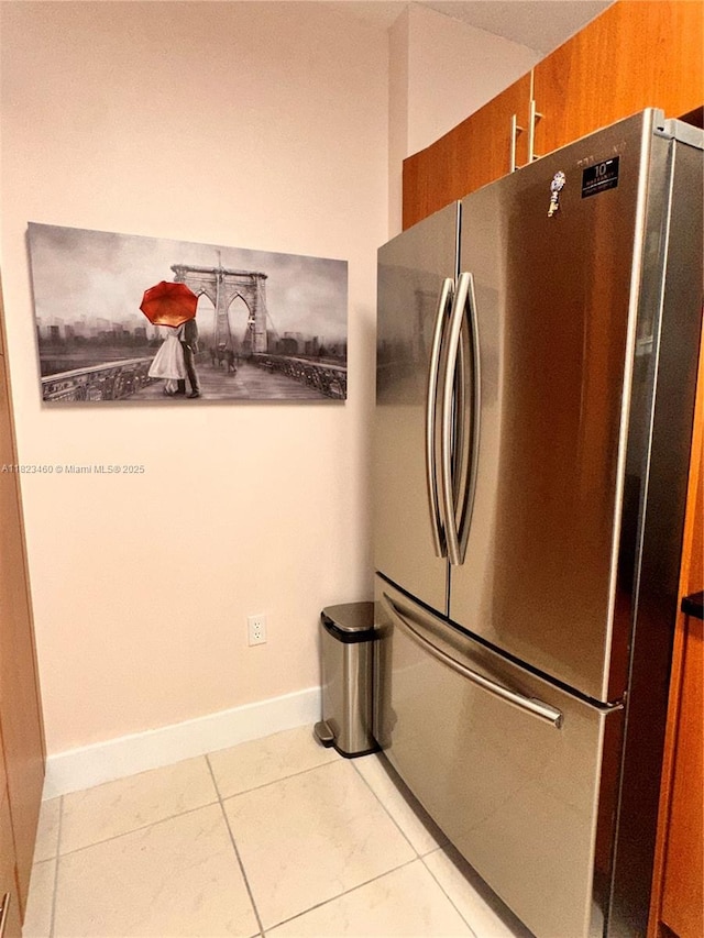 18800 NE 29th Ave Unit 412, Aventura, FL 33180 - kitchen view of freestanding refrigerator and brown cabinetry