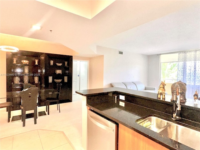 18800 NE 29th Ave Unit 412, Aventura, FL 33180 - kitchen featuring dishwasher, open floor plan, and dark stone countertops