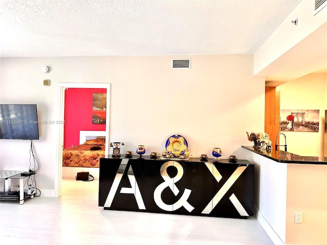 18800 NE 29th Ave Unit 412, Aventura, FL 33180 - reception area with a textured ceiling
