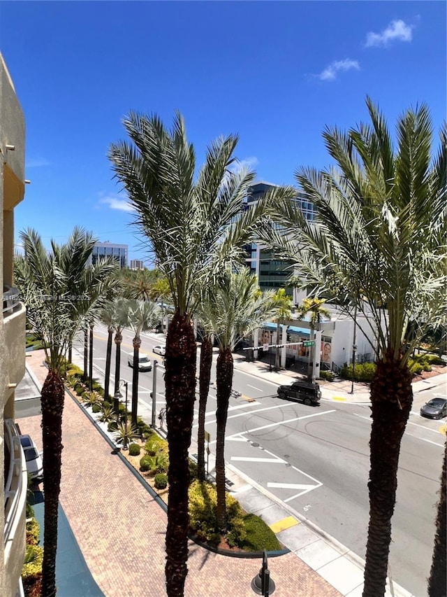 18800 NE 29th Ave Unit 412, Aventura, FL 33180 - view of asphalt street with sidewalks, curbs, and street lighting