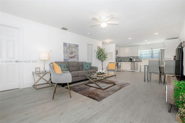 201 Columbus Pkwy, Hollywood, FL 33021 - living area with light wood-style flooring, a ceiling fan, and recessed lighting