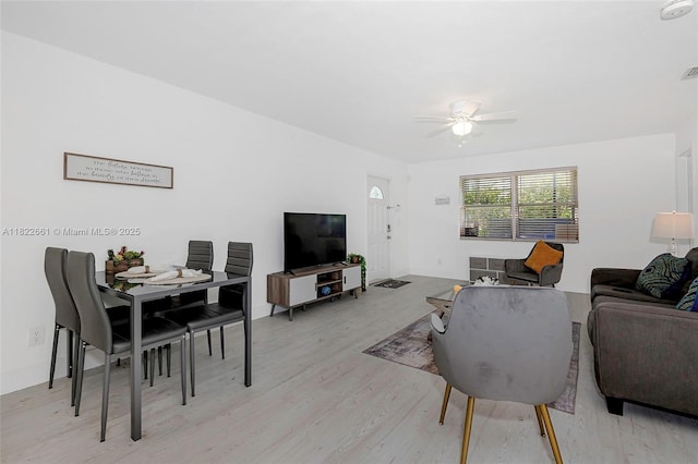 201 Columbus Pkwy, Hollywood, FL 33021 - living room with light wood-style floors and ceiling fan