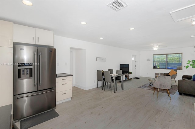 201 Columbus Pkwy, Hollywood, FL 33021 - kitchen with high end fridge, open floor plan, light wood-type flooring, recessed lighting, and white cabinetry