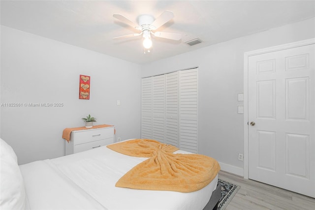 201 Columbus Pkwy, Hollywood, FL 33021 - bedroom featuring light wood-style flooring, a closet, and a ceiling fan