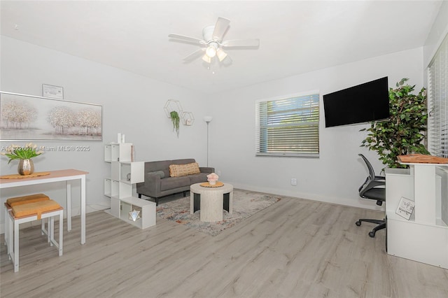 201 Columbus Pkwy, Hollywood, FL 33021 - living area featuring wood finished floors, a desk, and a ceiling fan
