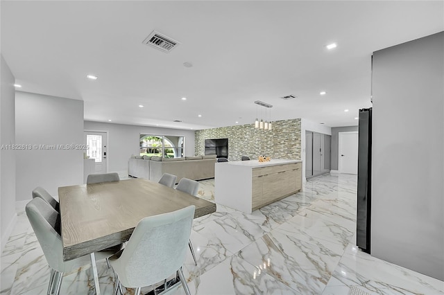 7481 NW 14th St, Plantation, FL 33313 - dining space featuring recessed lighting and light marble finish floors