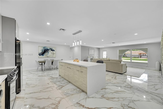 7481 NW 14th St, Plantation, FL 33313 - kitchen with black range with electric stovetop, modern cabinets, recessed lighting, a kitchen island, and light countertops